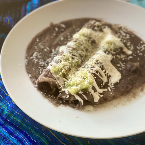 Enfrijoladas with salsa verde