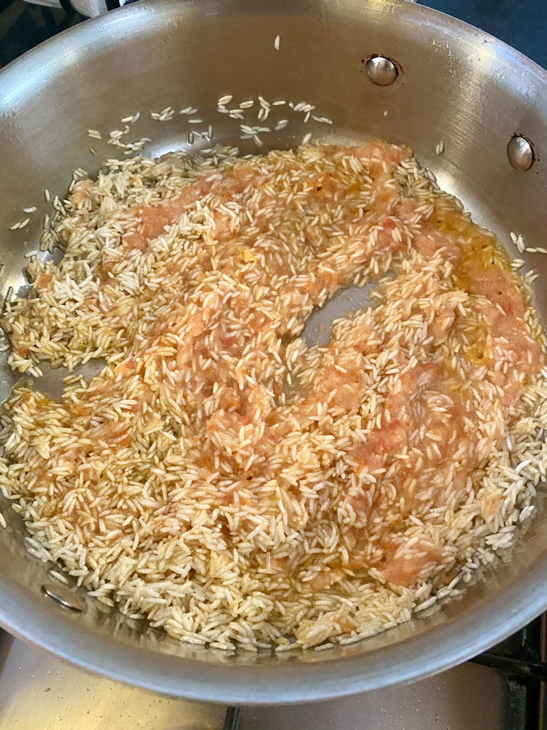 Tomato sauce added to rice