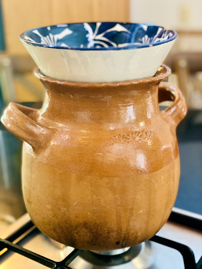 Clay pot set up for black beans