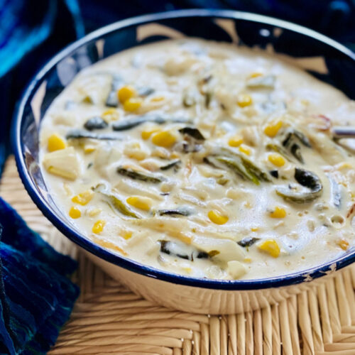 Bowl of roasted poblano strips in cream sauce