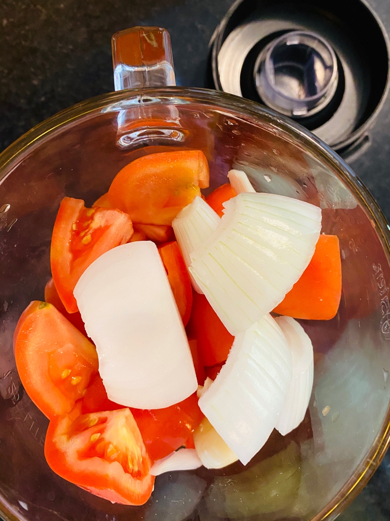 Tomato sauce ingredients in blender