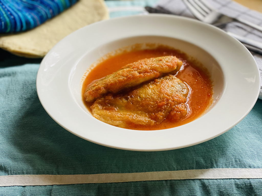 Plated stuffed squash blossoms