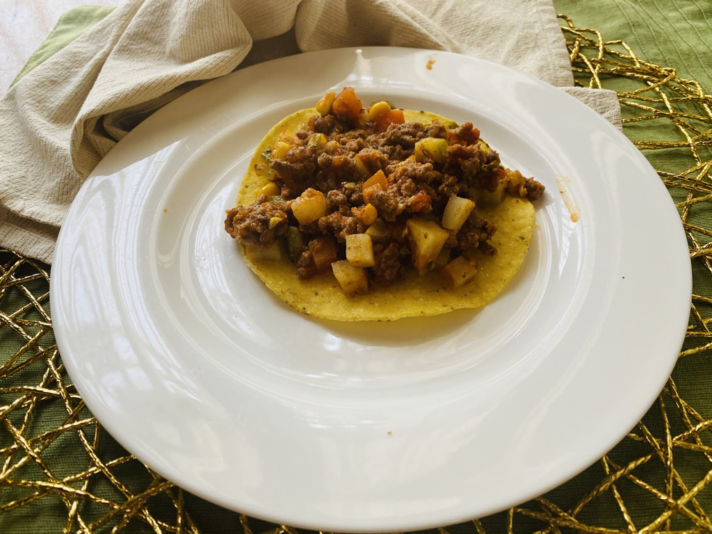 Easy Mexican Picadillo on a tostada