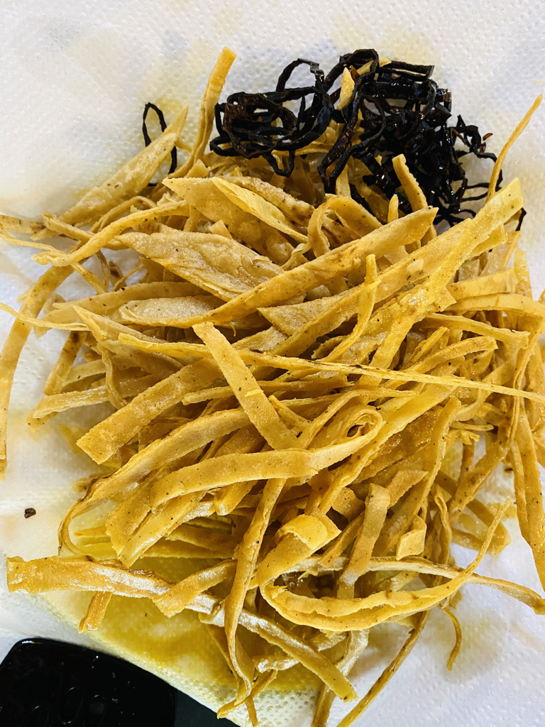 Crispy tortilla strips and pasilla chiles