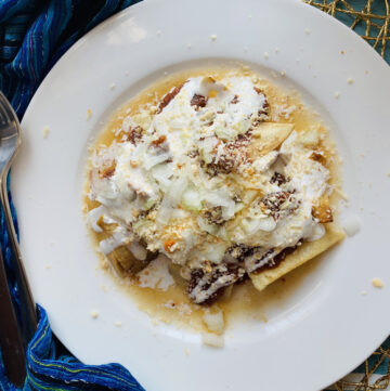 Chilaquiles with charred salsa roja