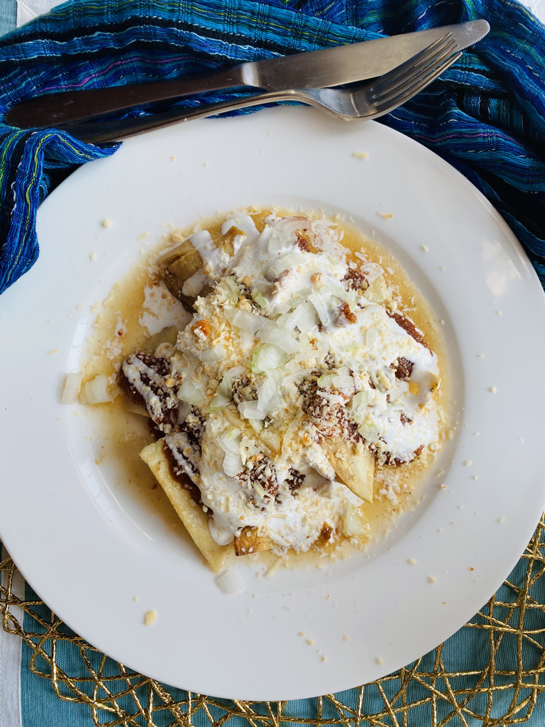 Chilaquiles with charred salsa roja