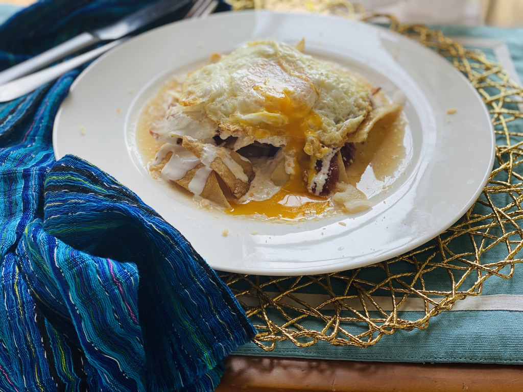 Chilaquiles with charred salsa roja and fried egg