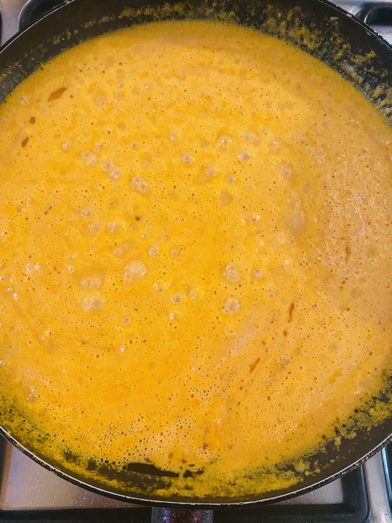 Enchilada suiza salsa lightly frying in oil