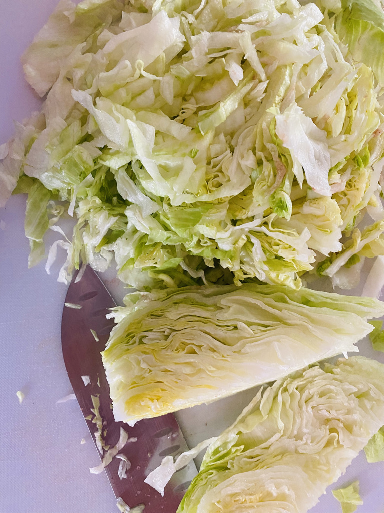 Thinly sliced lettuce