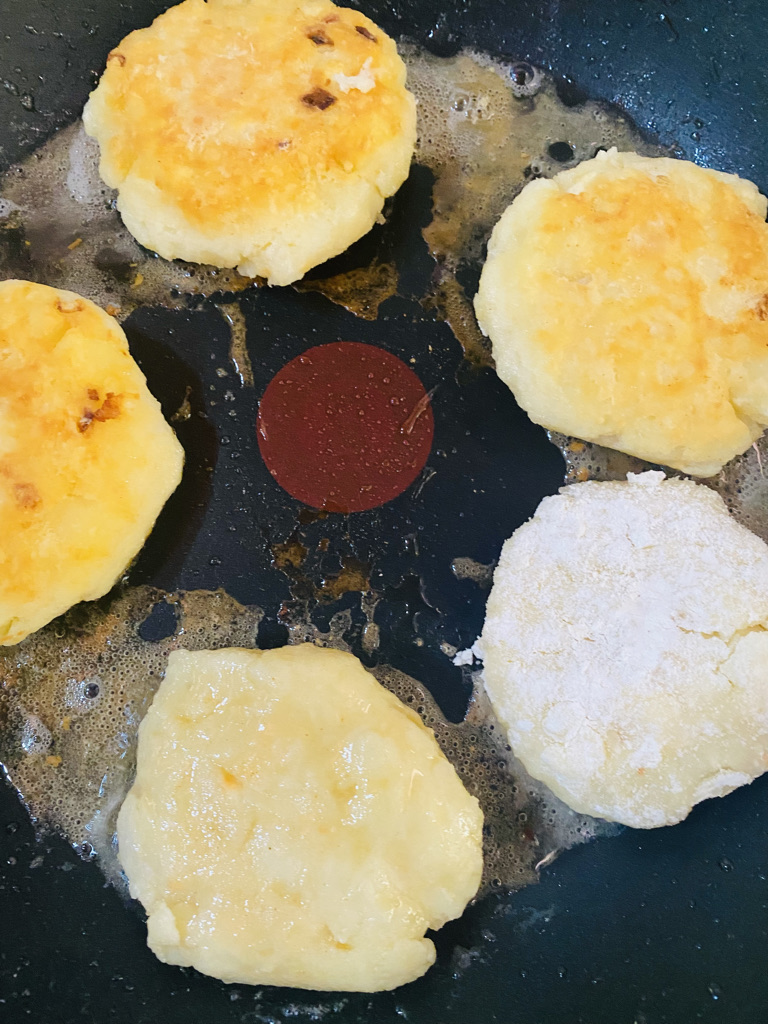 Potato fritters frying
