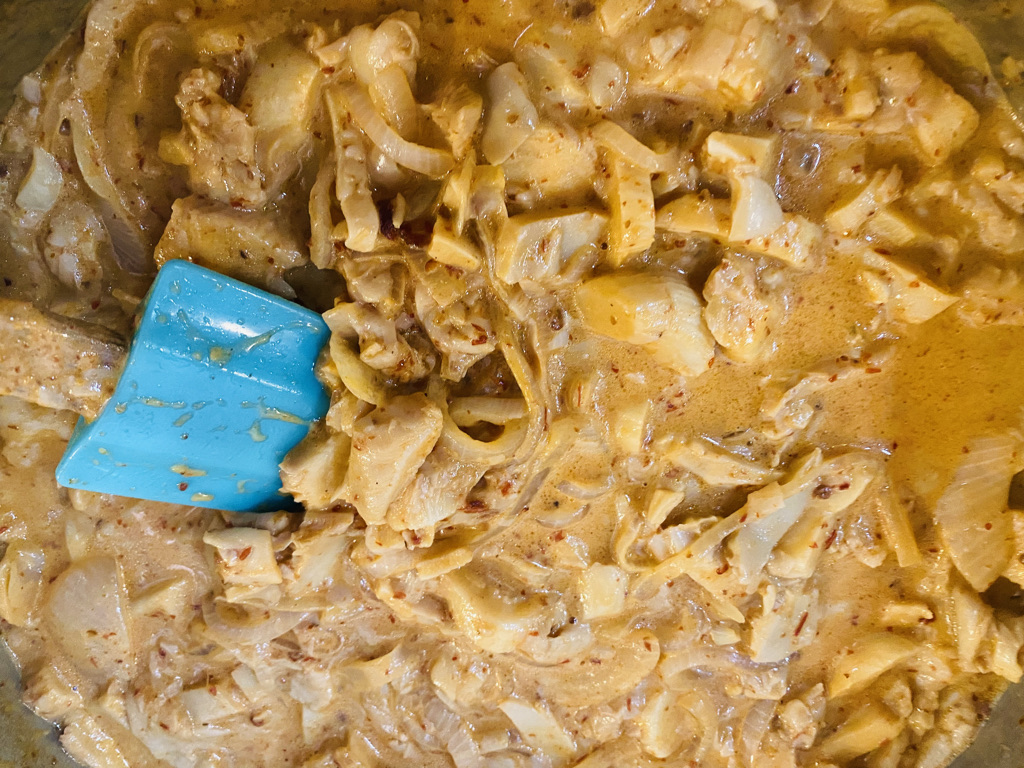 Oyster mushrooms cooking in creamy chipotle sauce