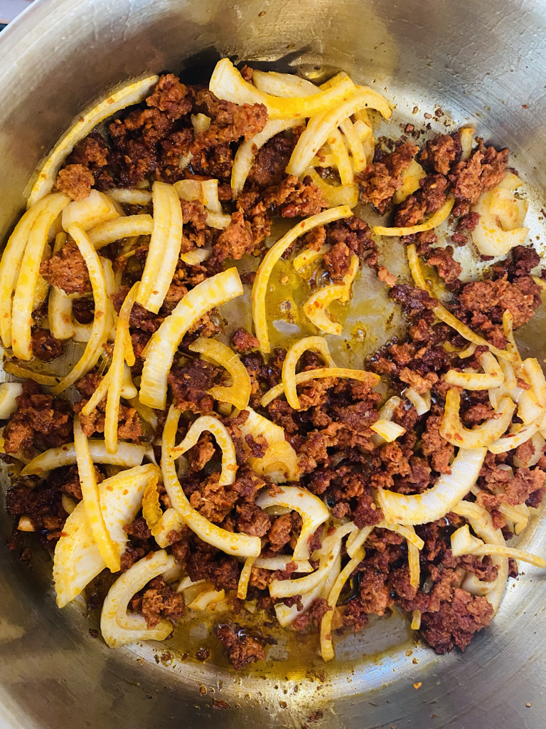 Chorizo and onions frying