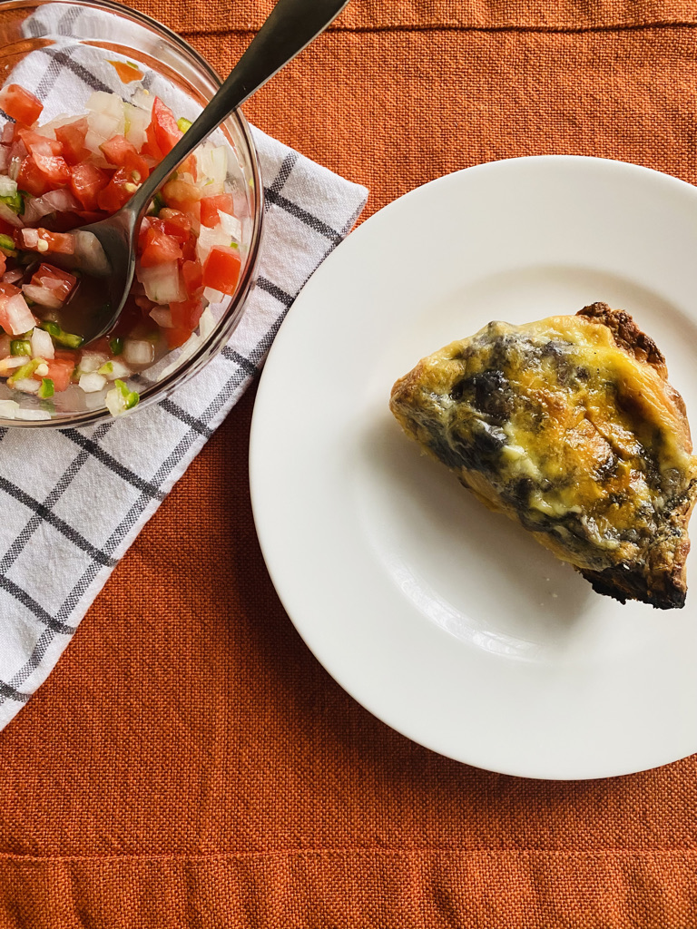 Mexican mollete with pico de gallo on side