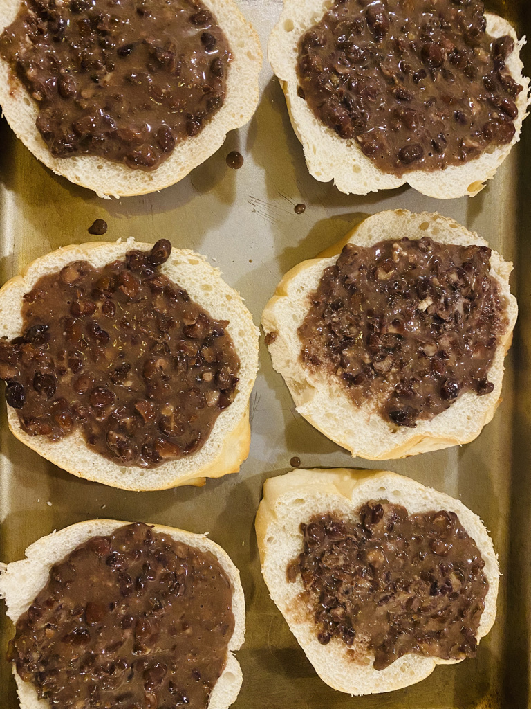 Teleras spread with mashed black beans