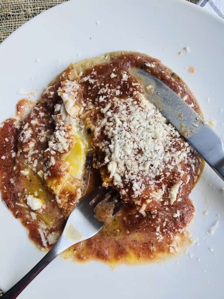 Smothered huevos rancheros
