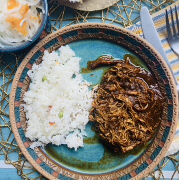 Saucy Mexican shredded chicken with pickled onions and habaneros