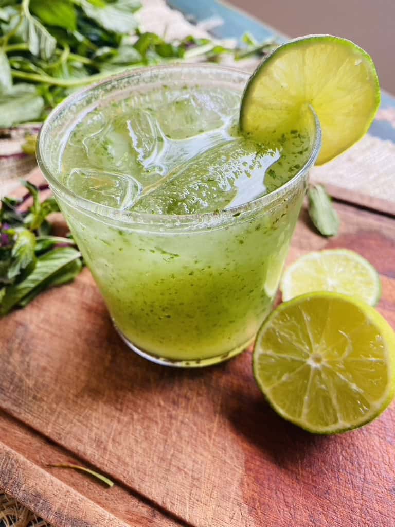 Glass with cucumber mint limeade made with peppermint