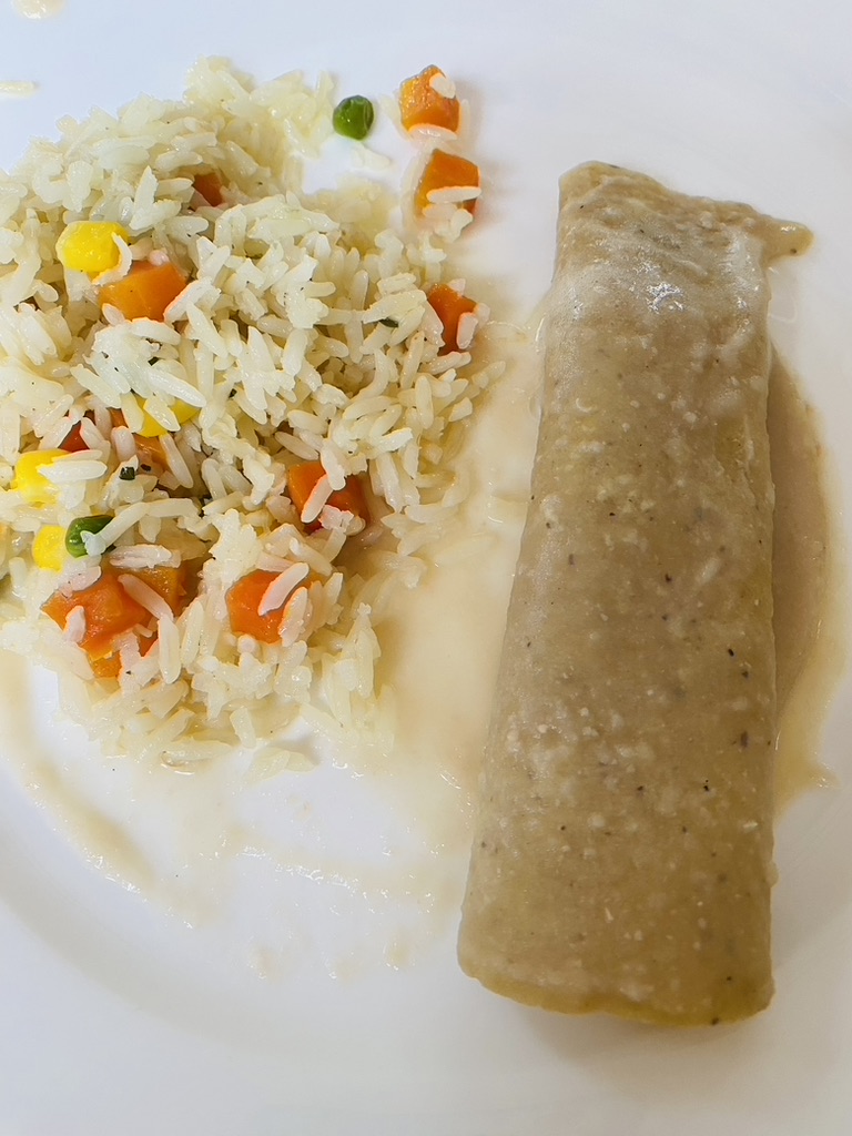 Peruvian bean enfrijolada with rice