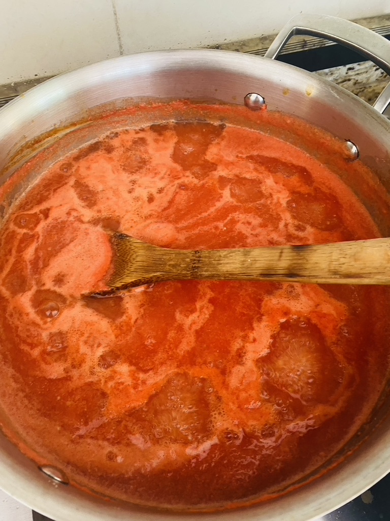 Tomato-based broth has darkened after cooking