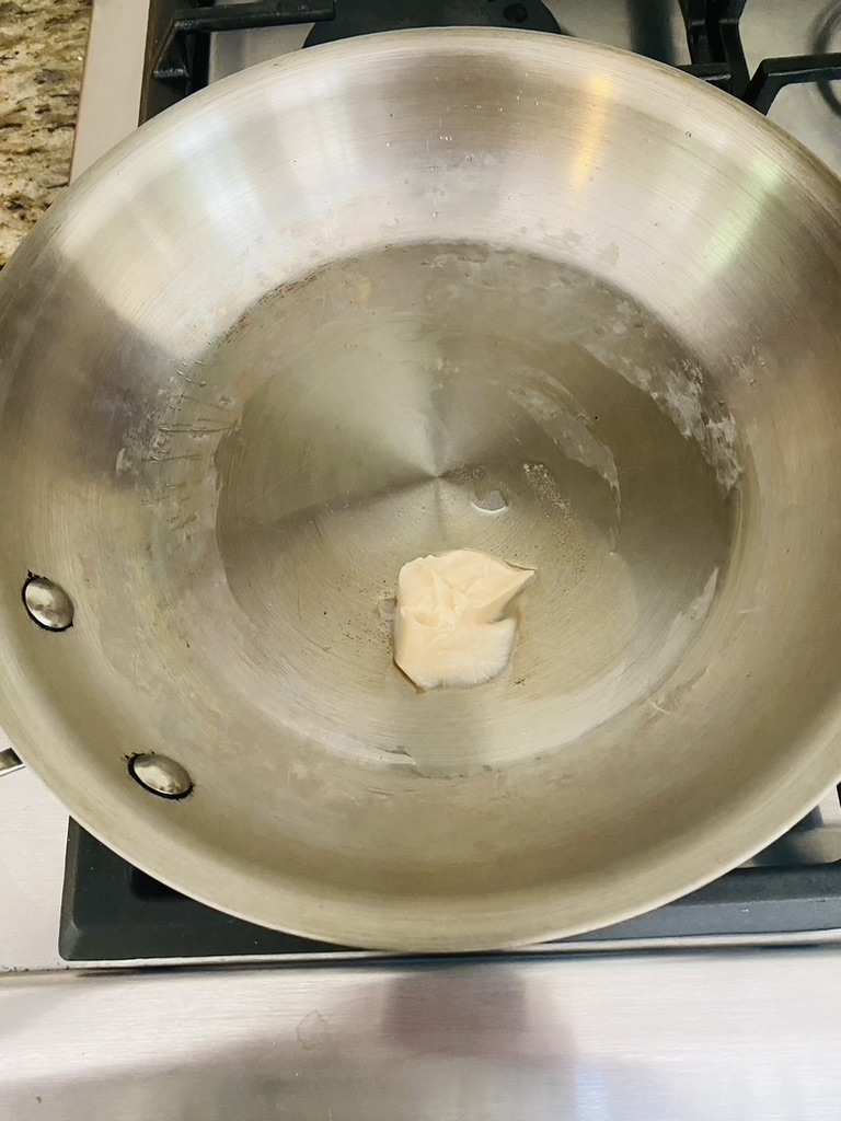 Lard melting in a skillet