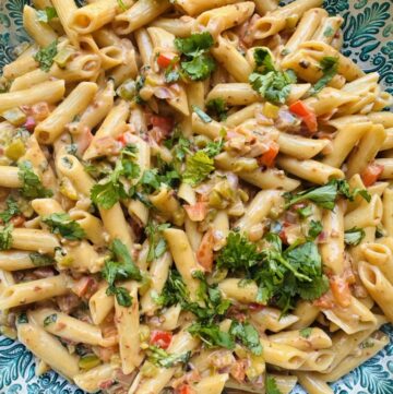 Creamy chipotle pasta in a large blue bowl