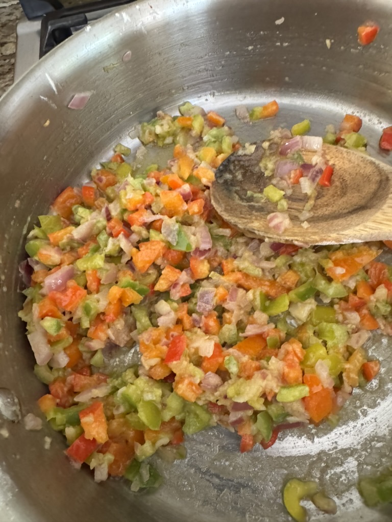 Diced onions and bell peppers with a roux