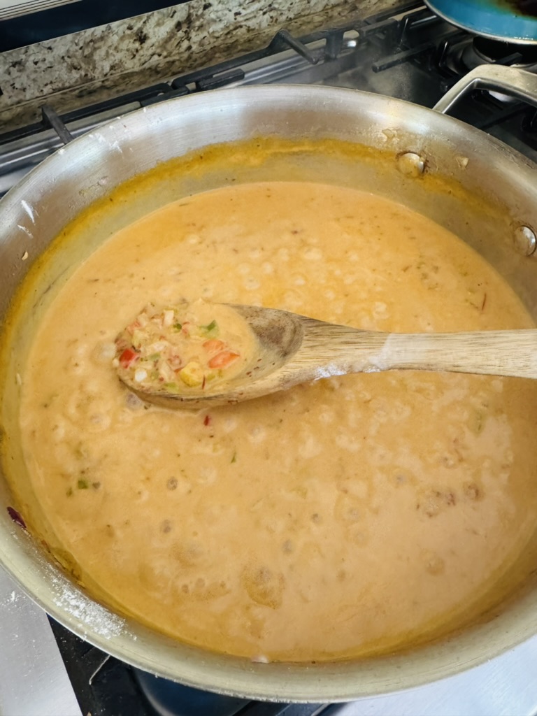 Fully cooked creamy chipotle sauce in a stainless steel pan