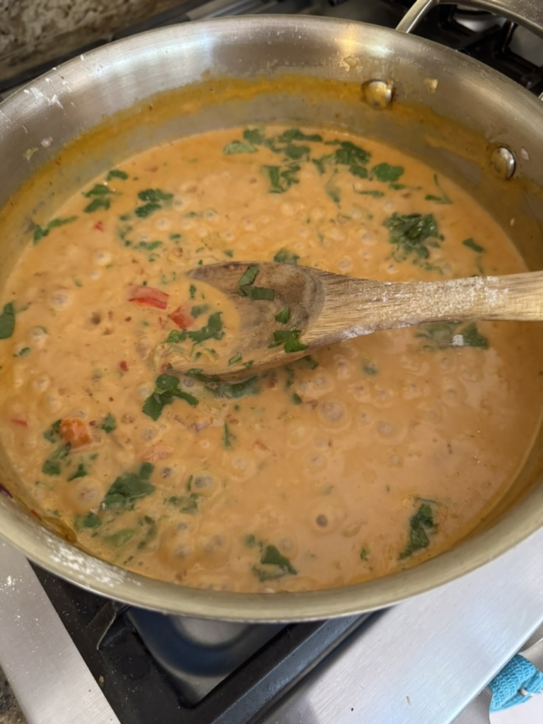 Creamy chipotle sauce with chopped cilantro