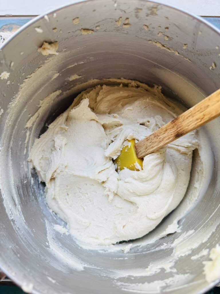Fully mixed vegan tamal masa in the bowl of a stand mixer