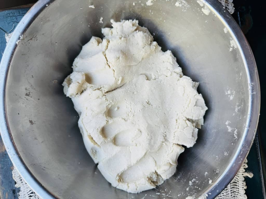 Masa harina made into a dough in a bowl